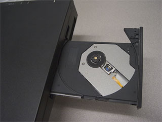 How to insert a CD in the CD-ROM, CD-RW, or DVD drive - ThinkPad
